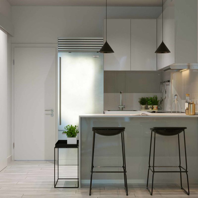 Minimalist kitchen with white cabinetry stainless appliances at PH AWA for sale Bella Vista Panama