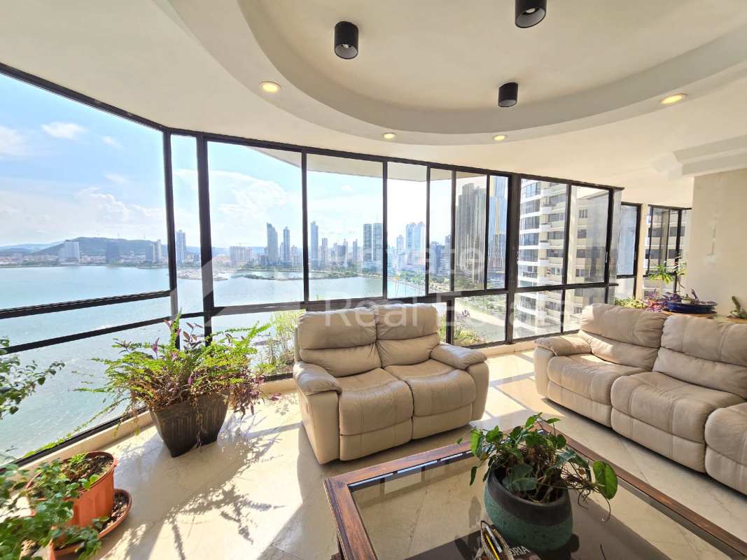 Modern Italian-designed kitchen with island and appliance suite at Punta Paitilla PH Mediterrané