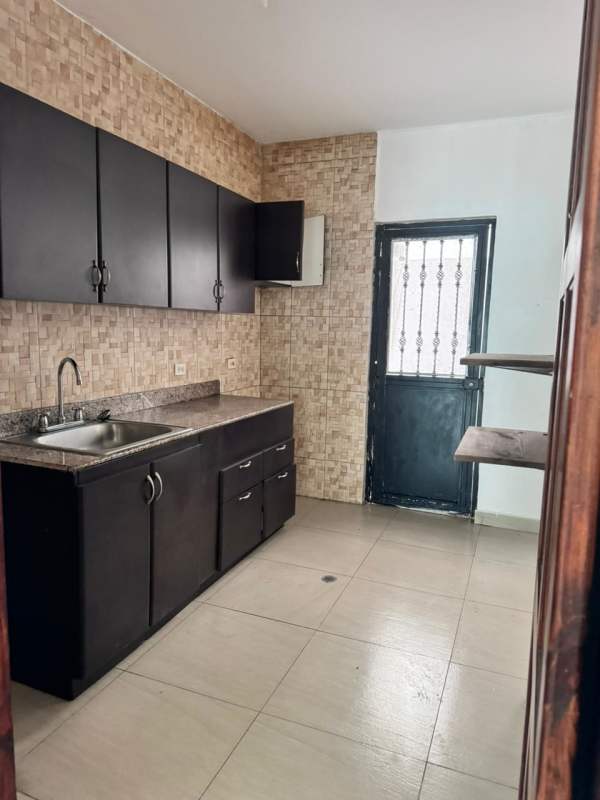 Functional kitchen with cabinets in apartment PH Dos Mares Villa de Las Fuentes Panama