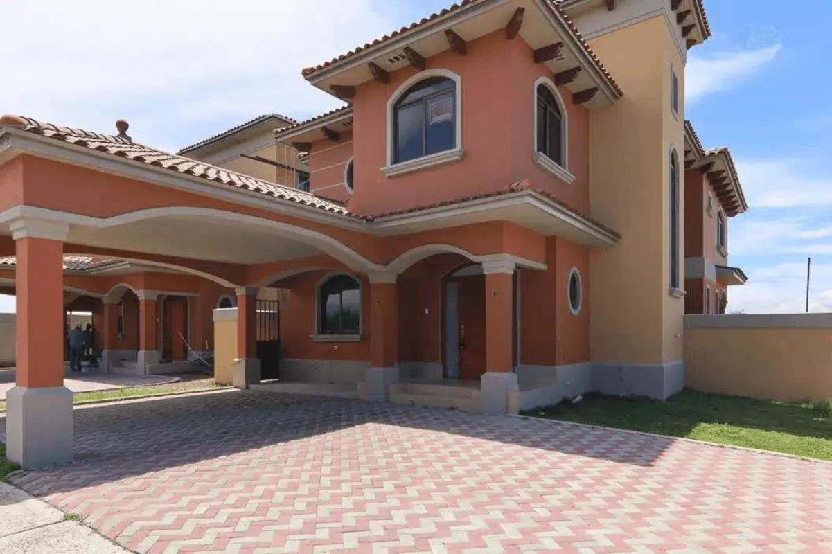 Spacious kitchen with granite counters and cabinetry in Costa Sur Panama