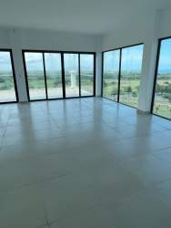 Spacious bedroom with terrace access, ocean and golf views at Vista Mar Penthouse Panama