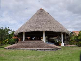 Rustic tropical kitchen wood dining table and natural light Buenaventura luxury villa Panama