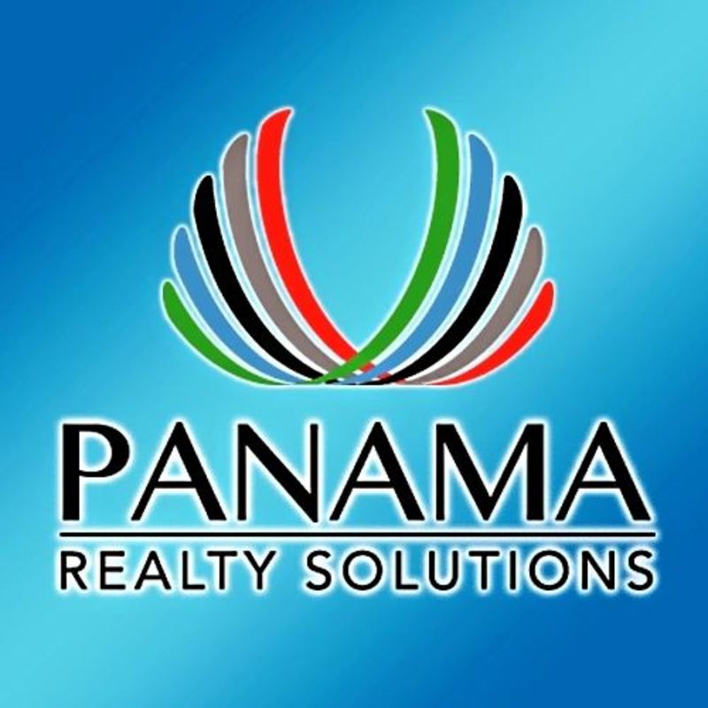 Spacious living room with large windows and skyline views at Waldorf Astoria Panama