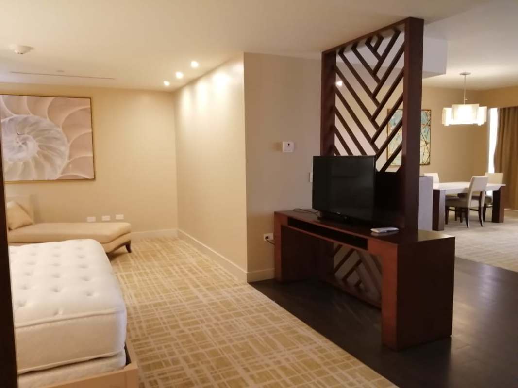 Luxury bathroom with glass shower and modern vanity at Waldorf Astoria Panama