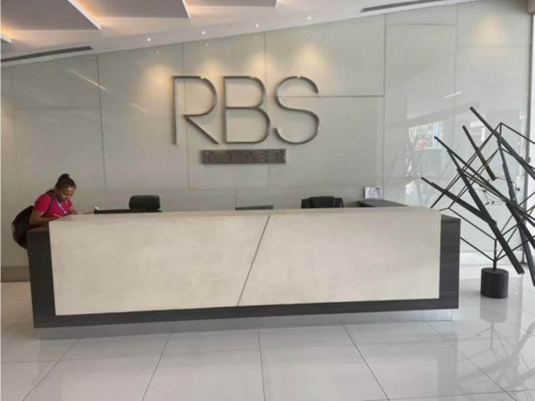 Bright office space with large window overlooking Avenida Balboa skyline in PH RBS Tower Panama City