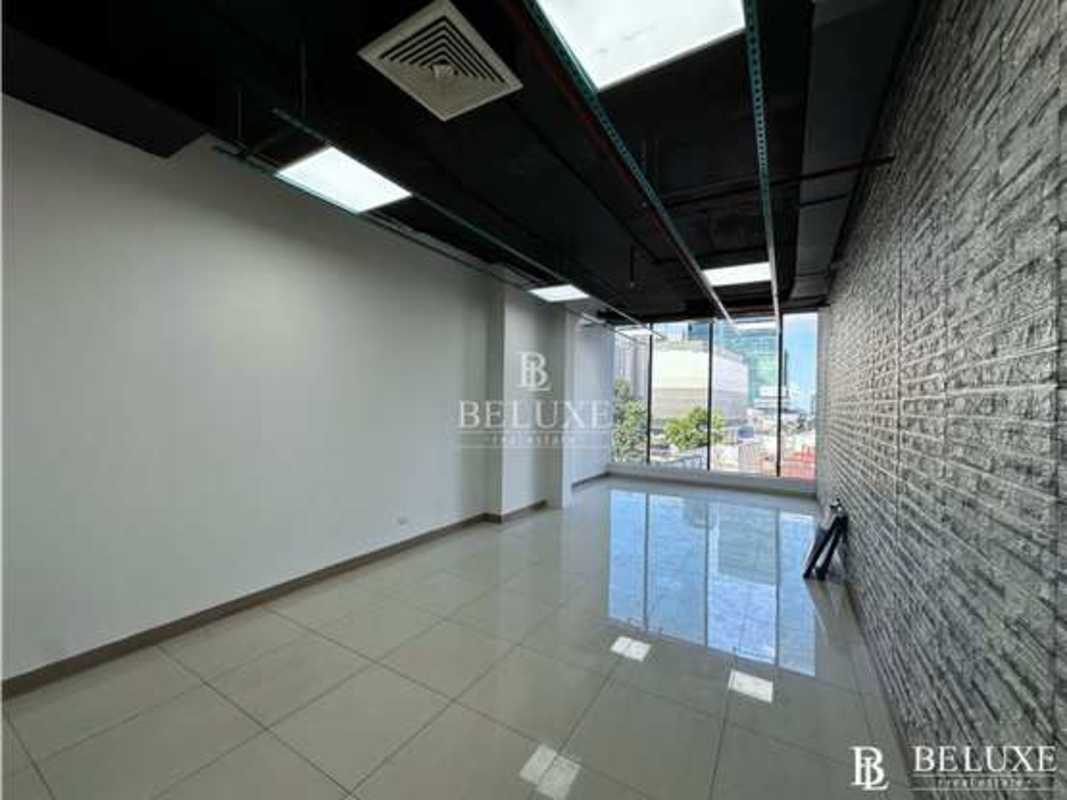 Bright empty office with large windows overlooking Avenida Balboa in RBS Tower Panama City