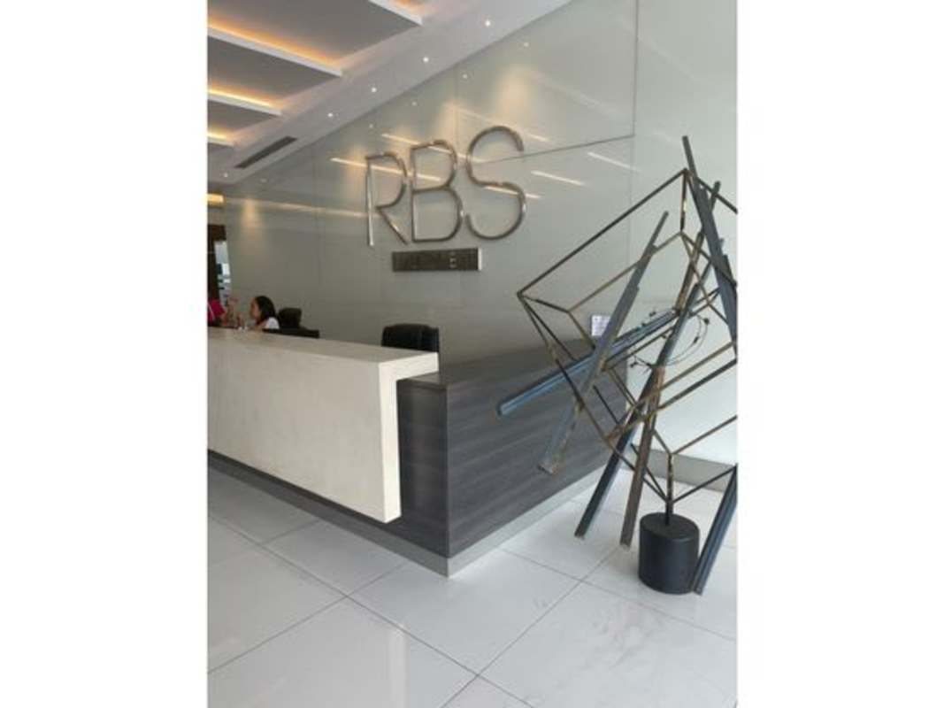 Elegant commercial lobby waiting area with sofa and coffee tables in RBS Tower