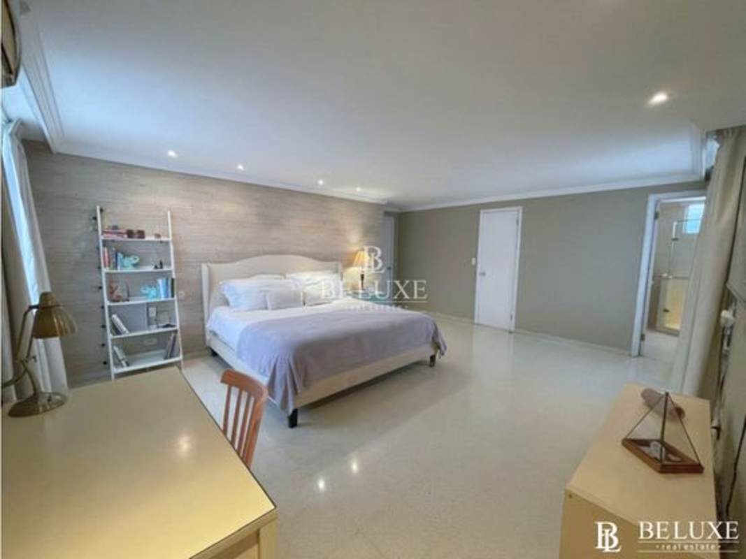 Bathroom with glass shower enclosure and modern sink PH La Ronda Panama City