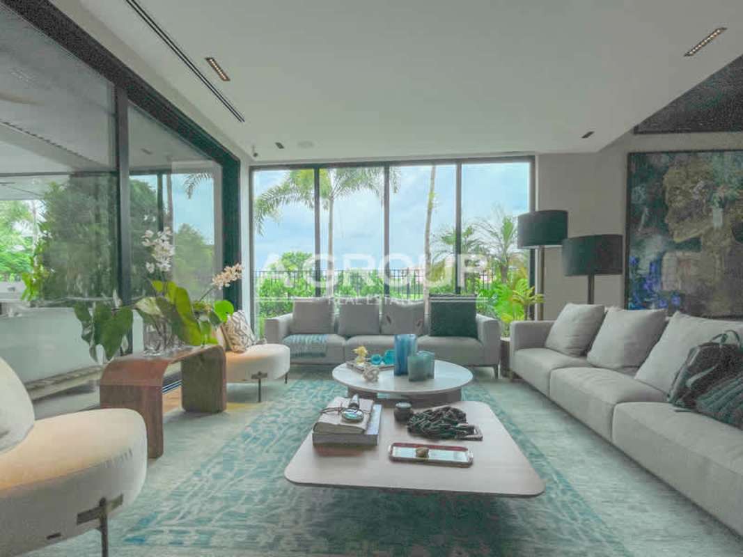 Infinity pool with lounge area, tropical gardens and terrace Island Estates Panama