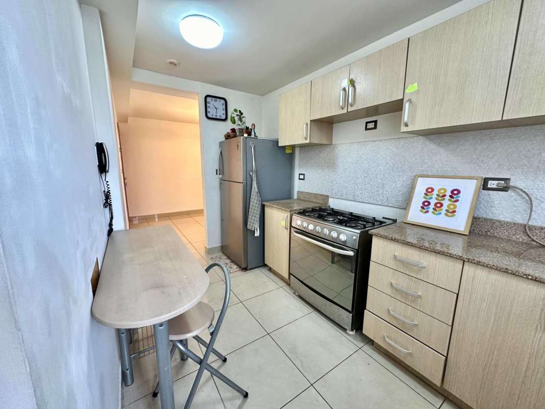 Contemporary kitchen with granite countertops, cabinets, appliances in PH Rokas Condado del Rey Panama