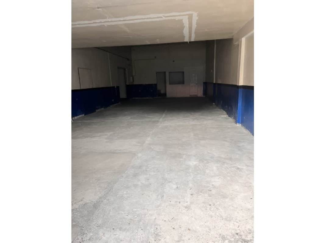 Warehouse space with concrete floors and unfinished ceiling at Betania commercial property