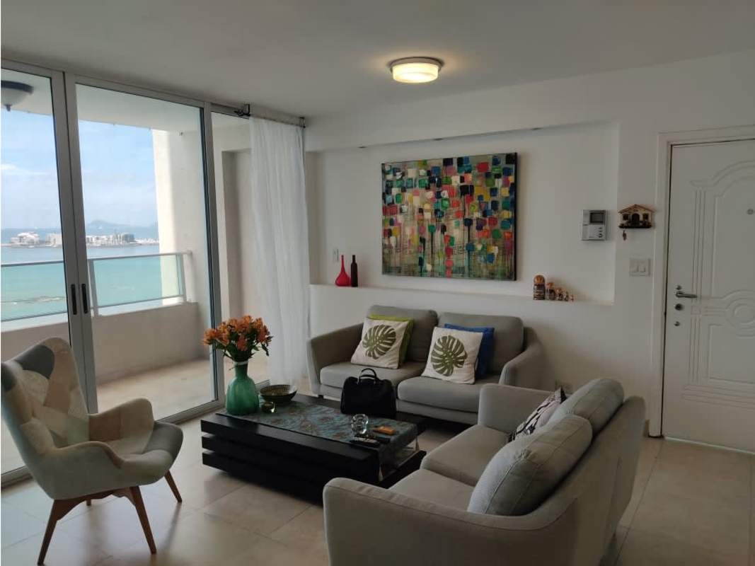 Dining area and living room panoramic window with Pacific view at PH Terras Panama