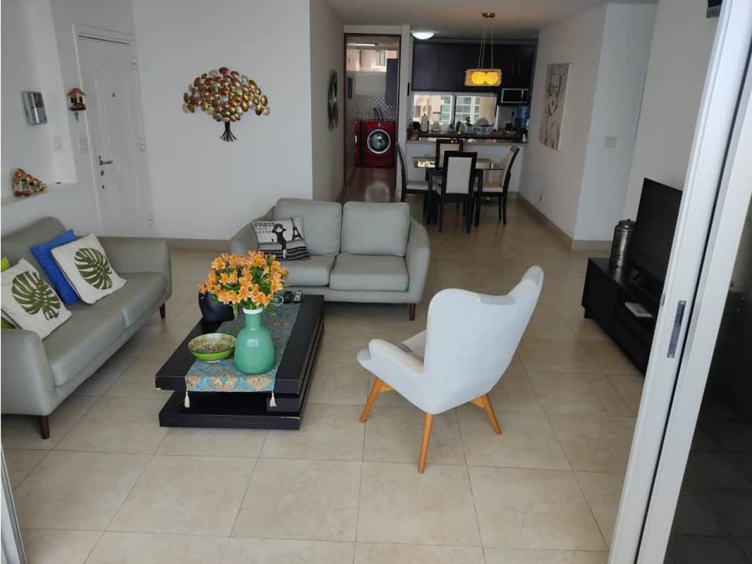 Open concept living space at PH Terras San Francisco with balcony ocean view