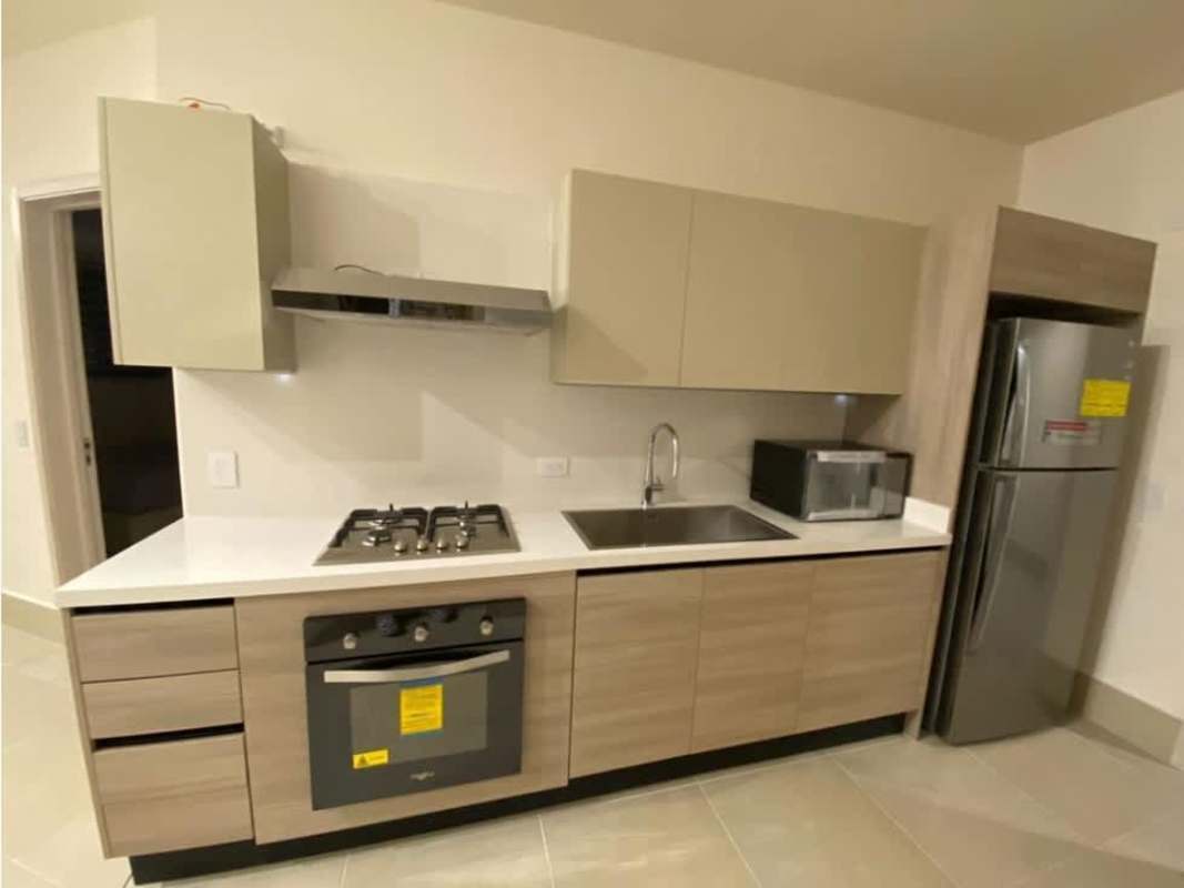 Modern kitchen with quartz countertops and stainless steel appliances in PH Oceana Santa Maria Panama