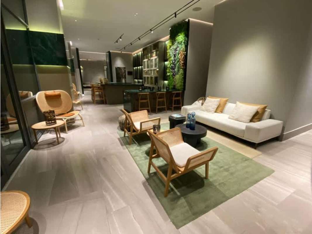 Compact laundry room with washer dryer units in PH Oceana Santa Maria Panama luxury apartment