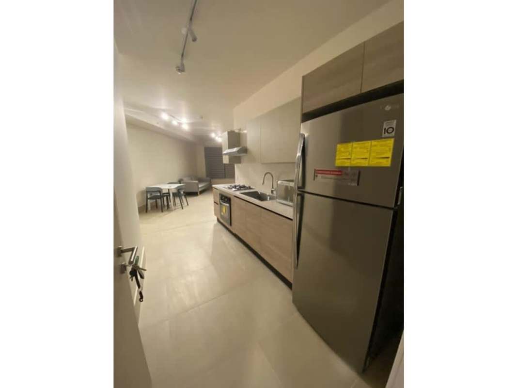 Bright open-plan living dining area with balcony access in PH Oceana Santa Maria Panama