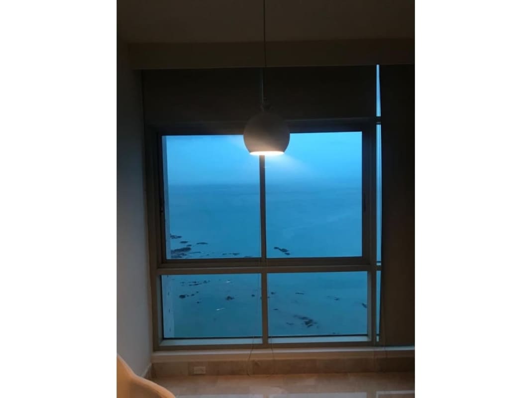 Modern kitchen with granite countertops and appliances in PH Pacific Point Punta Pacifica