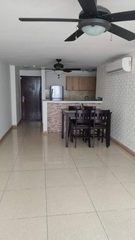 Bedroom with built-in closet, window, and tile floors PH Terrazas del Rey Panama City Panama