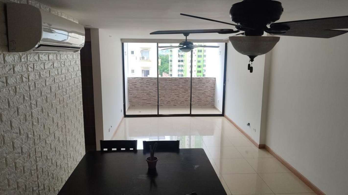 Living dining room with balcony, AC unit, and tile floors PH Terrazas del Rey Panama City Panama