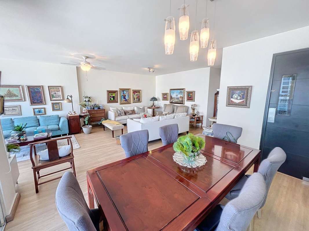 Spacious open living and dining room with balcony access at PH Bella Vista Park in Panama City