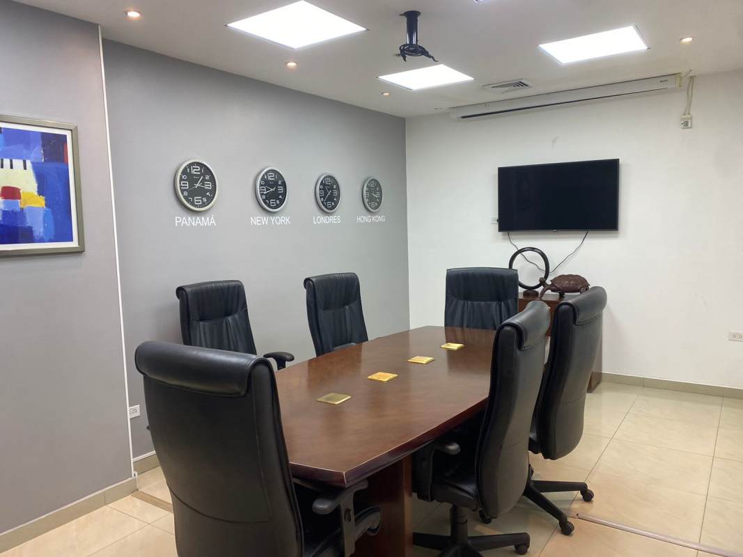 Modern office with large windows overlooking skyline Ocean Business Center Panama