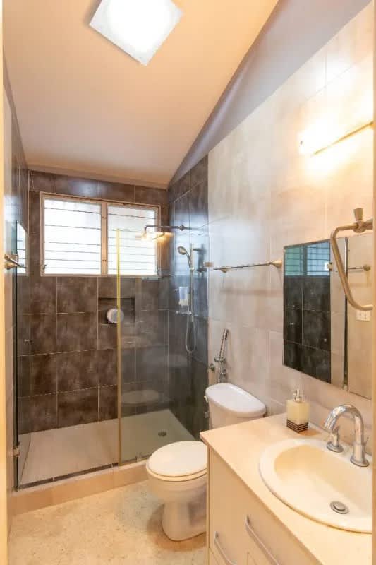 Secondary bedroom with large window and split AC in Obarrio Bella Vista duplex