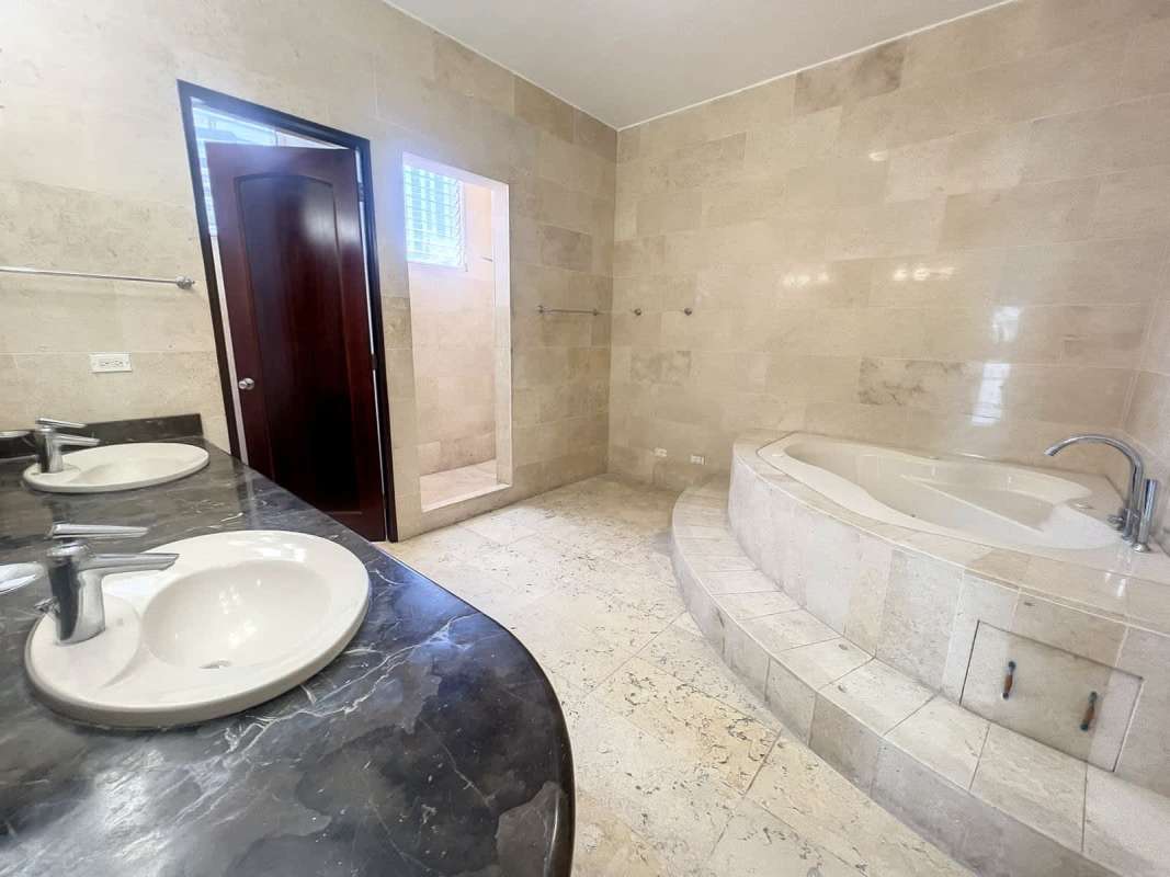 Master bedroom with large windows overlooking Pacific Ocean PH Vista del Sol Punta Paitilla Panama