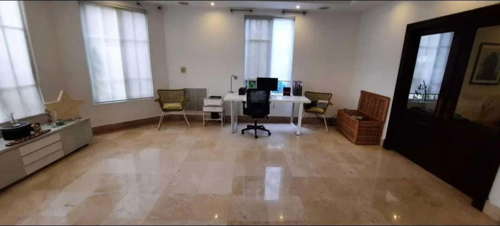 Covered terrace perfect for entertaining beside pool at luxury home Costa del Este Panama