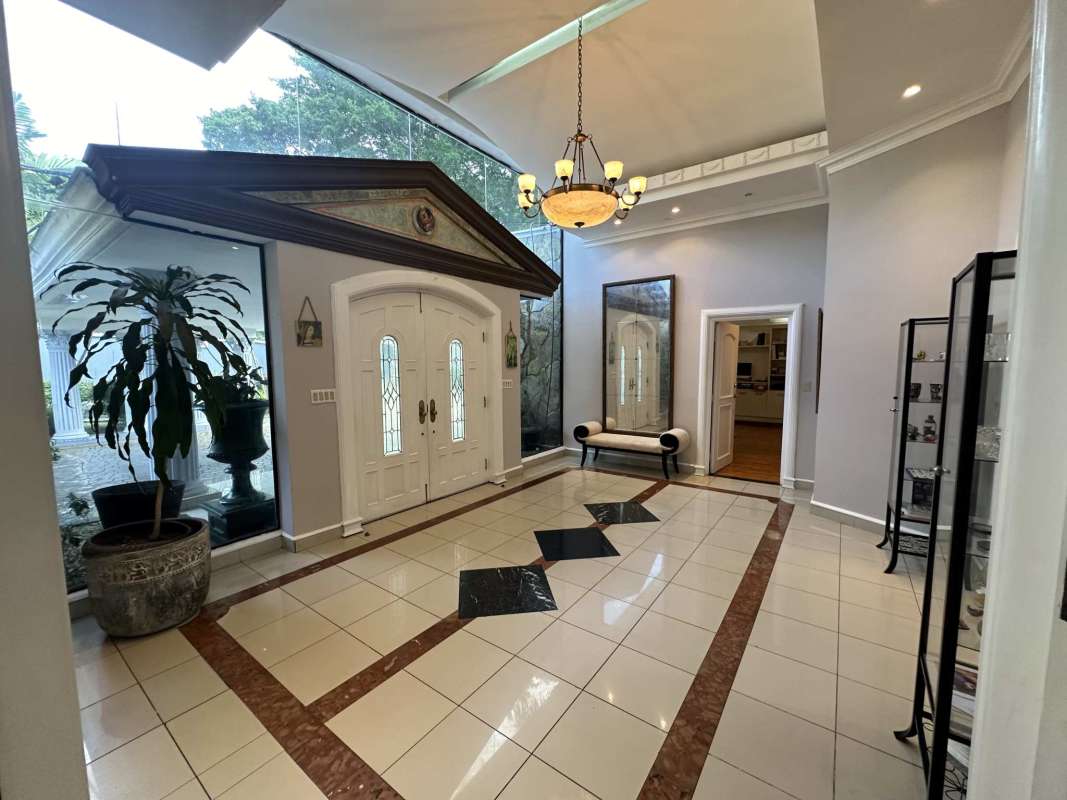 Family den with garden views in luxury home for rent Altos del Golf Panama City