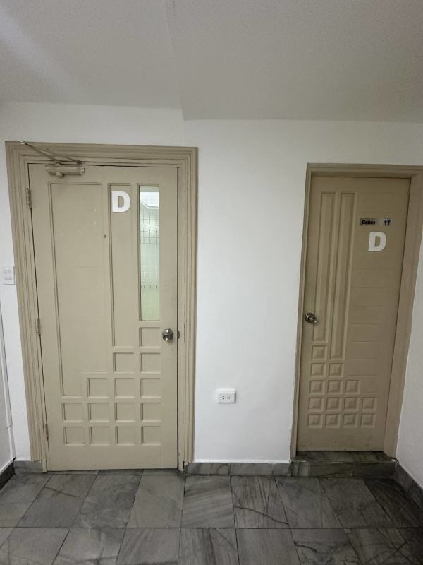 Hallway with doors leading to loft office units Torre BAC Panama City