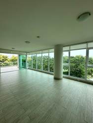 Open kitchen with breakfast bar stainless appliances ocean view Punta Barco PH Solea