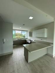 Bright bedroom floor-to-ceiling window tropical views PH Solea Punta Barco Panama