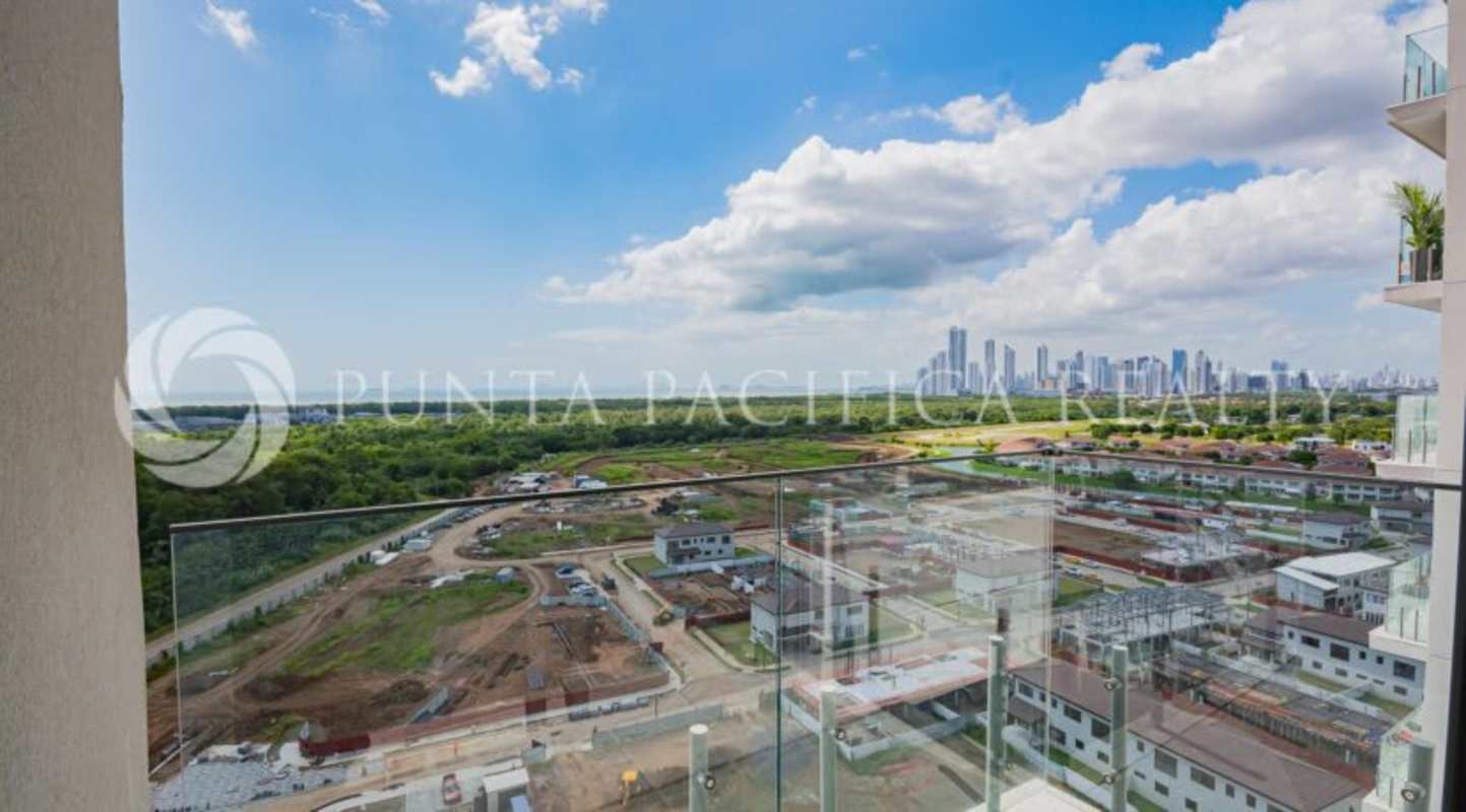 Modern furnished living room with balcony and ocean view at The Sands Avenida Balboa Panama