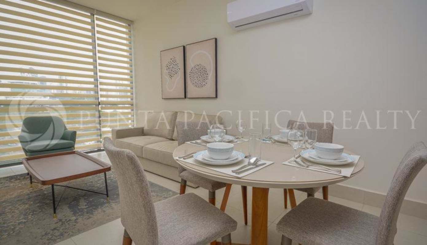 Furnished bedroom with city ocean view, large window, AC and built-in closet PH Coco Place Coco del Mar Panama City