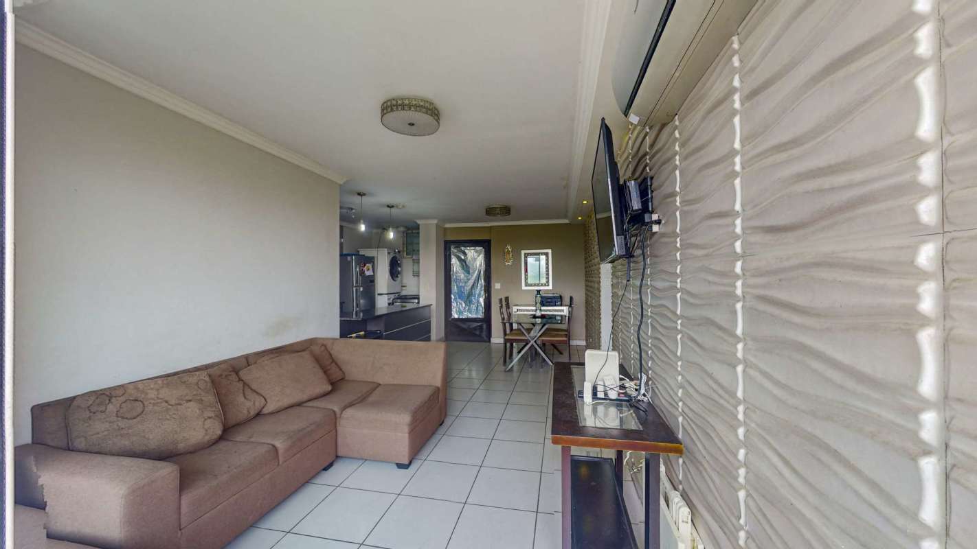 Open kitchen with granite counters, tile backsplash, and wood cabinetry in PH Green Park Tower 500 Panama City