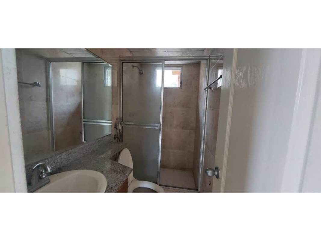 Colorful children's playground with slides and benches inside Mallorca Park Village Panama