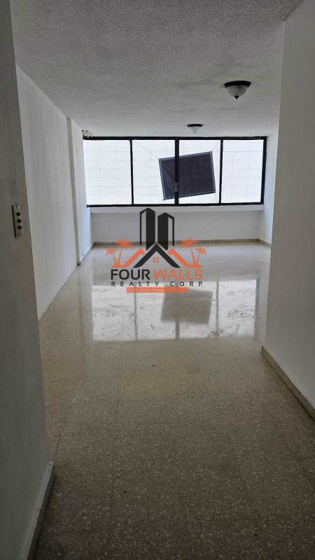 Bright bedroom with large window overlooking Obarrio neighborhood PH Monaco Panama