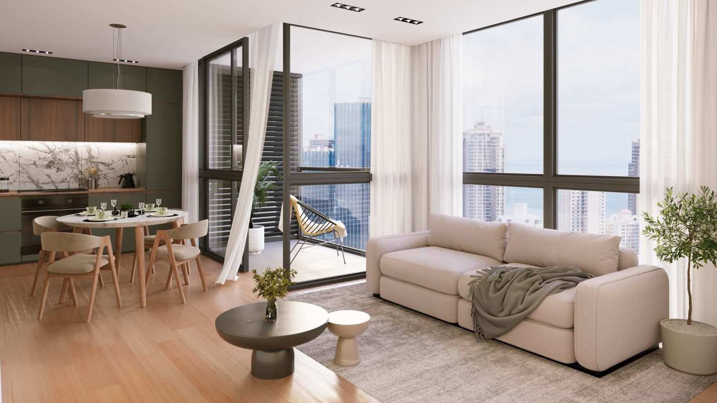 Modern apartment with kitchen and living area open to balcony overlooking Panama City skyline