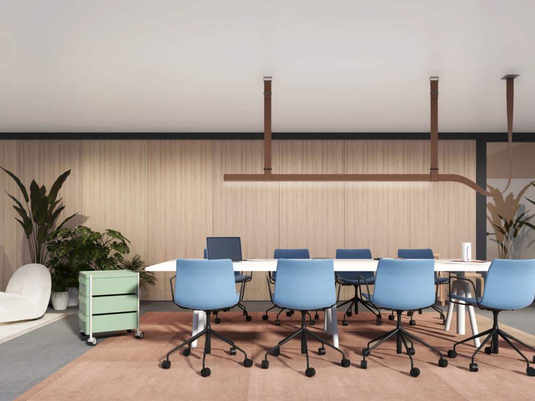 Shared coworking lounge with modern conference tables and greenery PH Nook Residence Panama