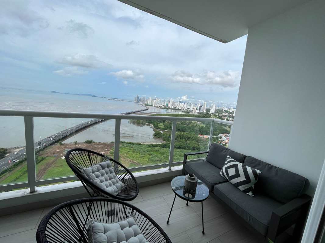 Oceanfront balcony with glass railing overlooking Panama City and ocean in PH Asia