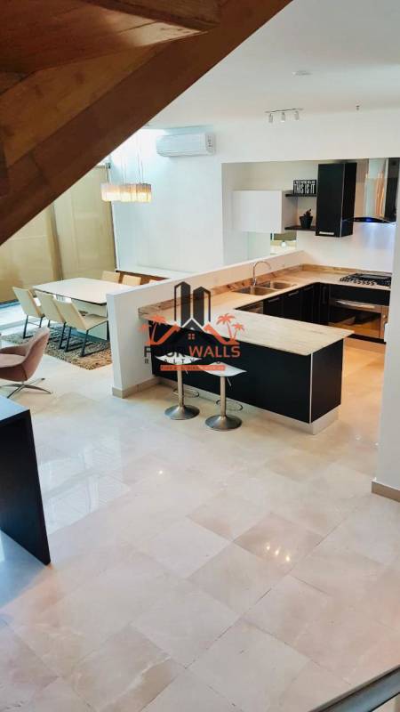 Floating staircase connecting duplex loft apartment in PH Pacific Village Panama