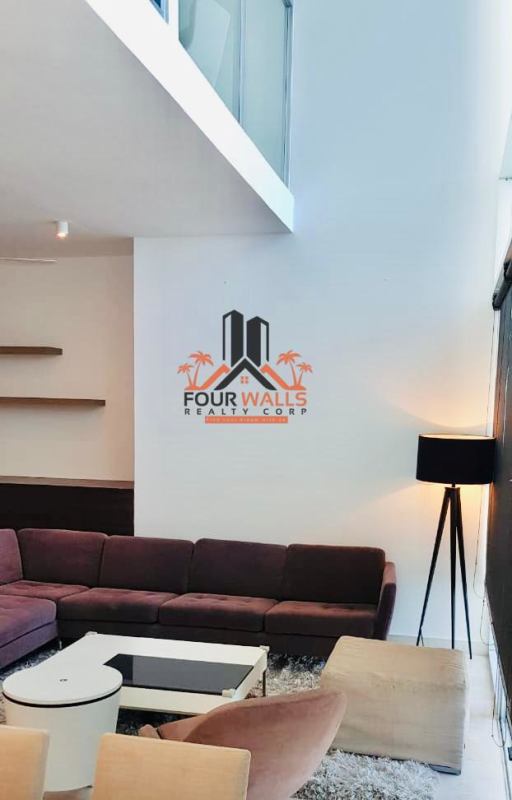 Modern bathroom with glass enclosed shower in PH Pacific Village Punta Pacifica