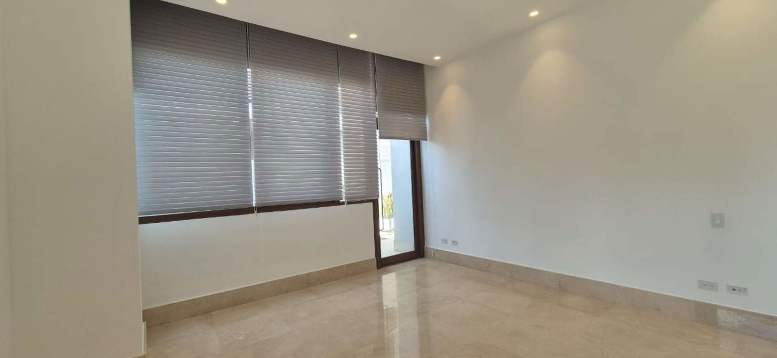 View of private marina and city skyline from balcony in Ocean Reef Islands apartment