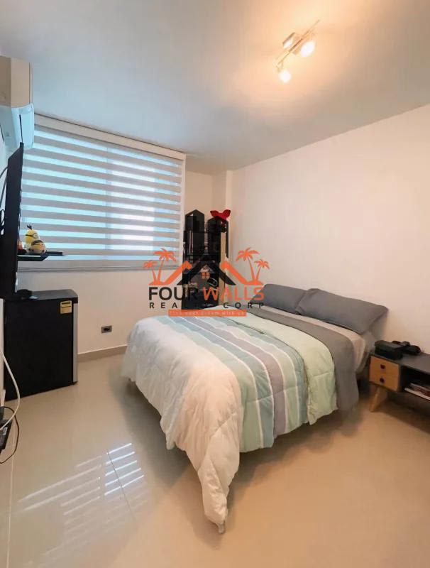 Spacious modern kitchen with granite island, stainless steel appliances in PH Waterfalls San Francisco Panama