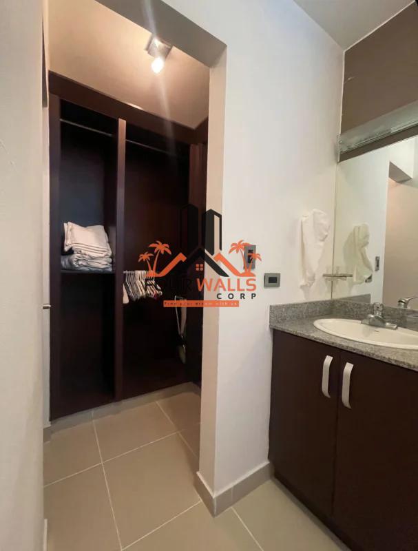 Spacious bedroom with large window panoramic city view built-in closet split AC PH Waterfalls Panama
