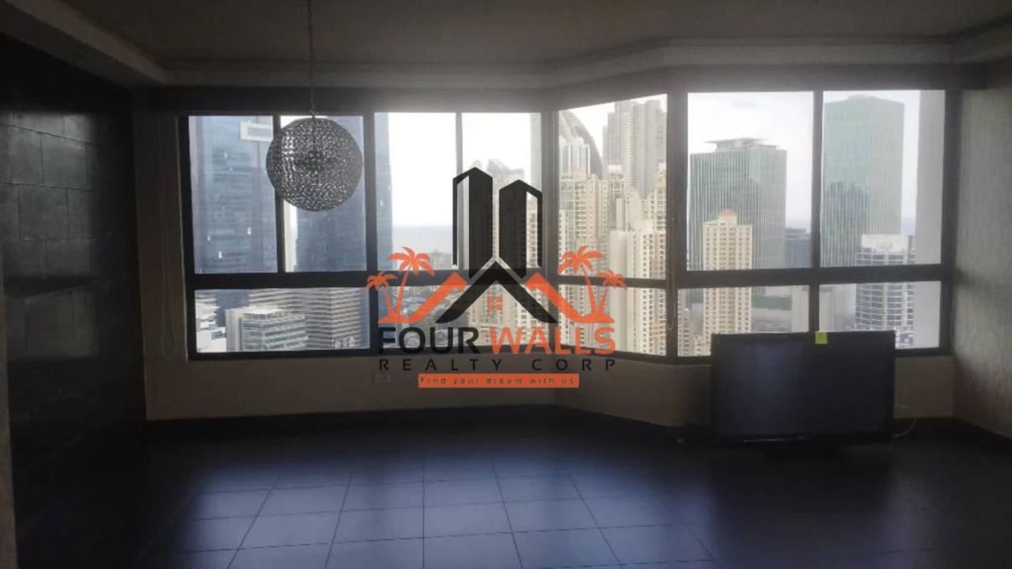 Open living-dining space with full windows and city view at PH Pacific Coast San Francisco