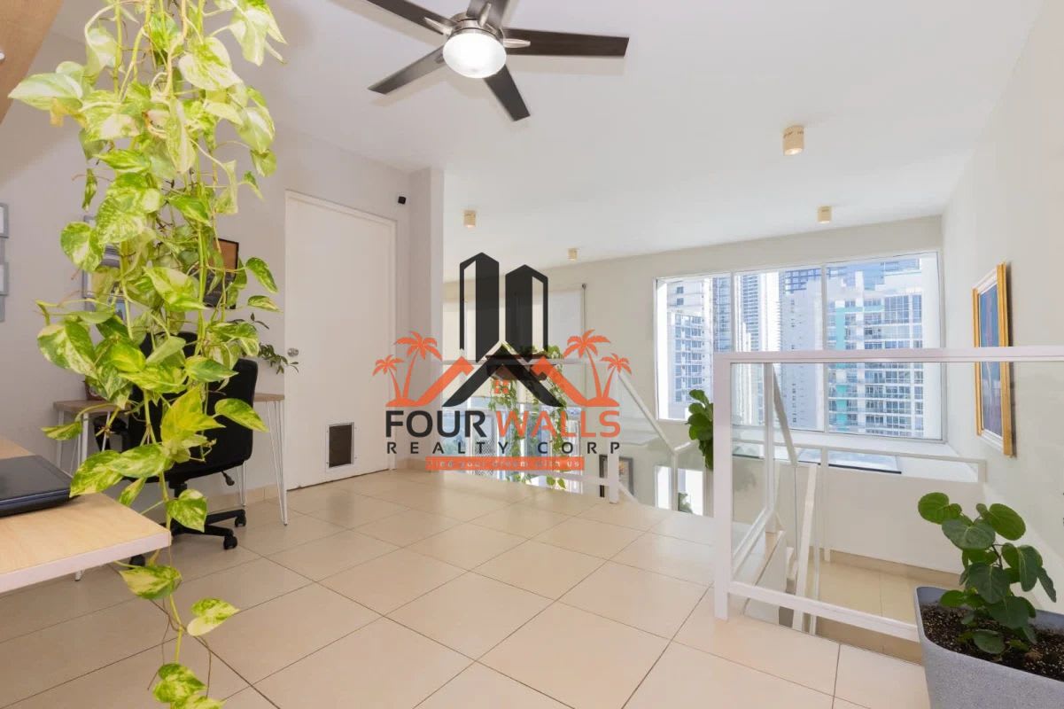 Contemporary kitchen with granite countertops and appliances in furnished loft PH Blue Park Panama City