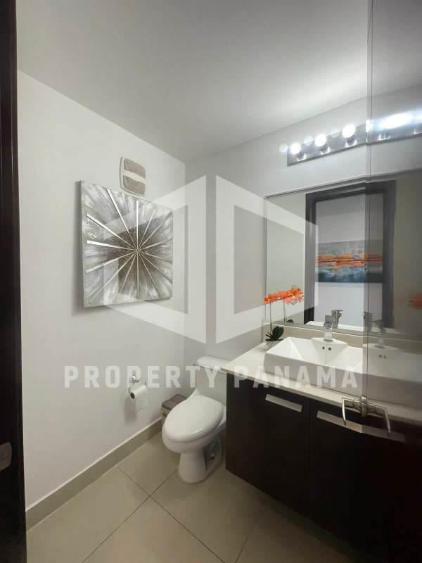 Contemporary bathroom with glass-enclosed shower and granite vanity in PH Oceanaire Panama