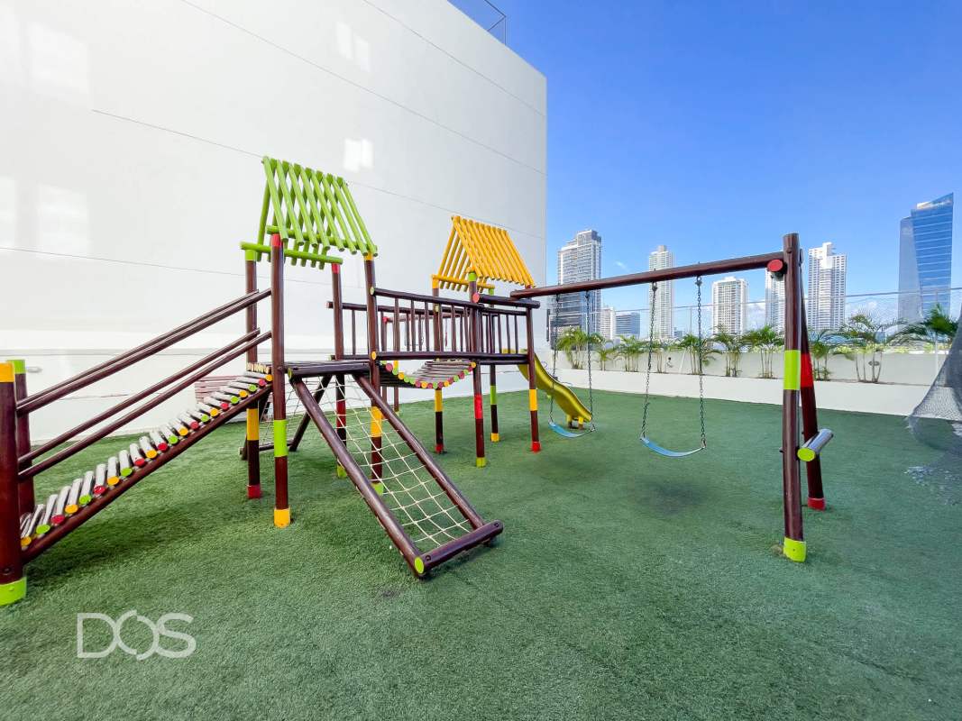 Elegant dining area with large windows, stone accent wall, and luxury finishes at PH Torre Zeus Panama