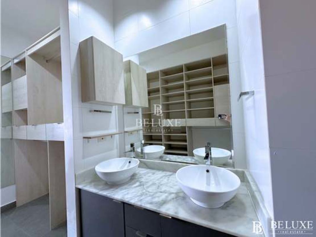 Bright dining and living room with balcony access in PH Element Panama City